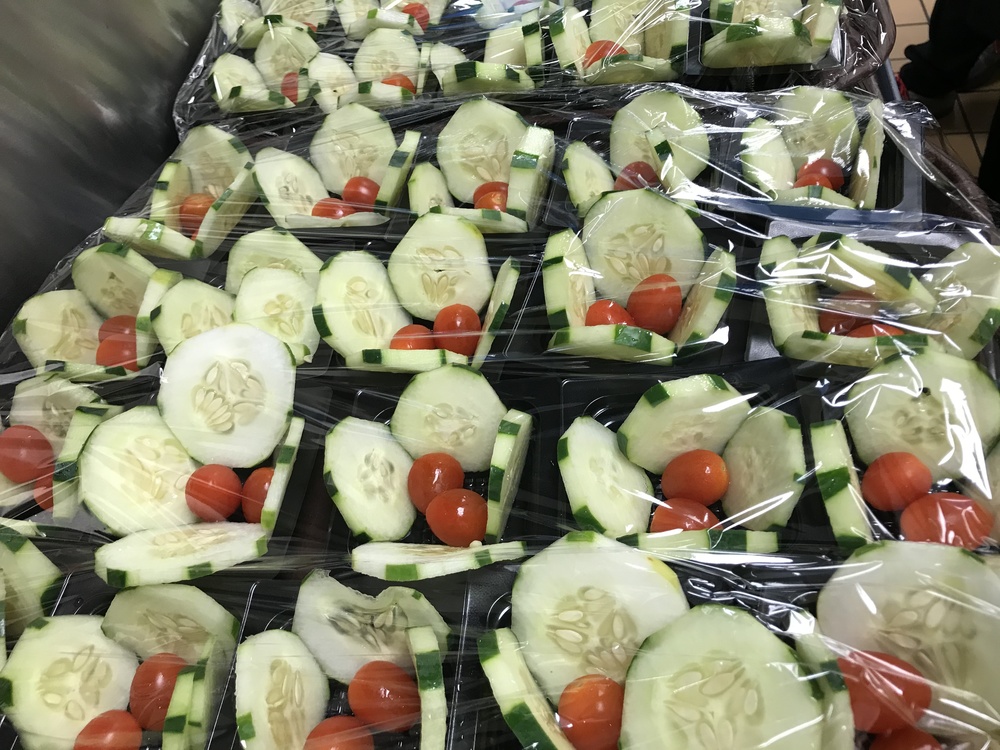 Cucumbers, tomatoes with ranch dressing.