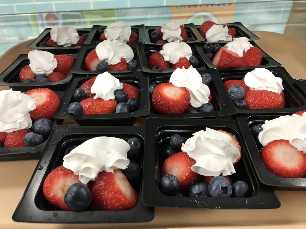 Strawberries,blueberries and whip cream